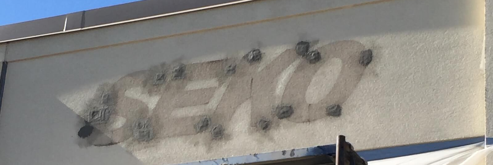 Replace a building sign? What you need to know about repairing your facade.